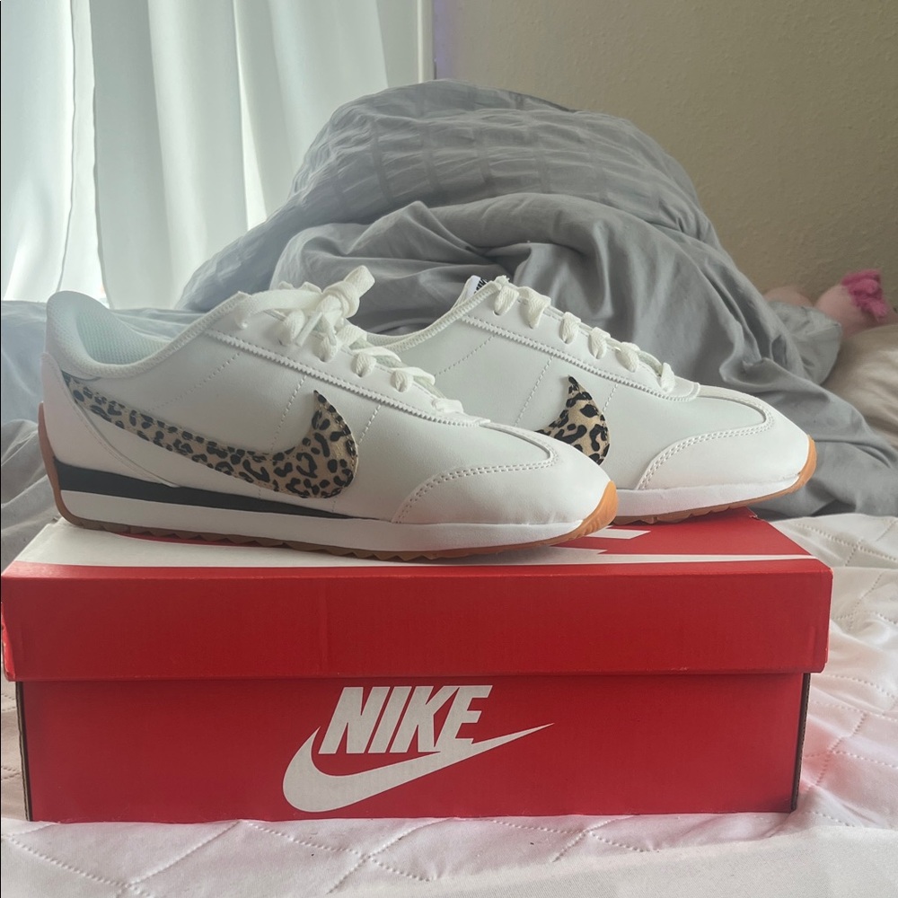 Nike White Sneakers with Leopard Print Swoosh